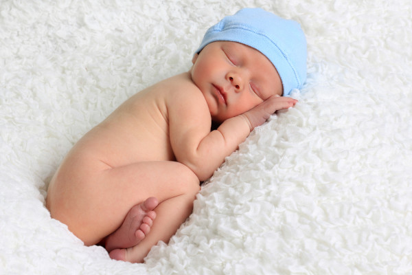 Sleeping newborn baby boy.