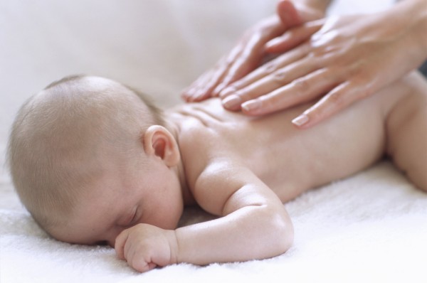 Baby boy (2-5 months) receiving hand massage
