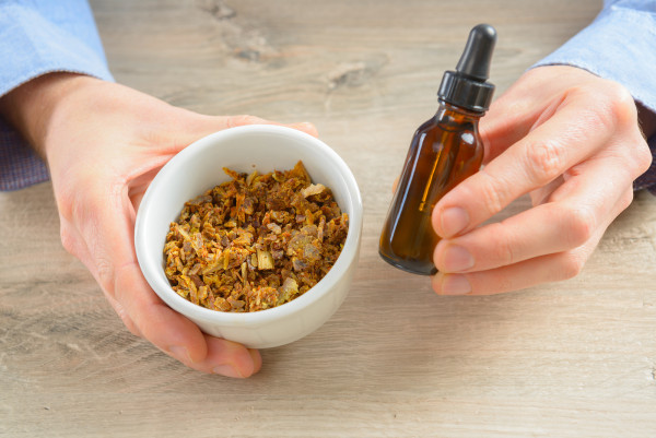 Natural propolis, mixture that honey bees collect.