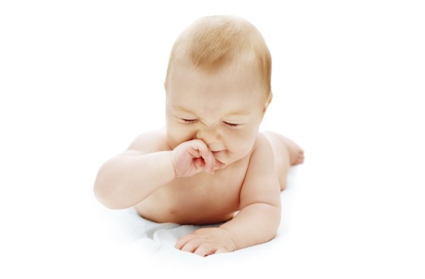 Baby's scratching his nose